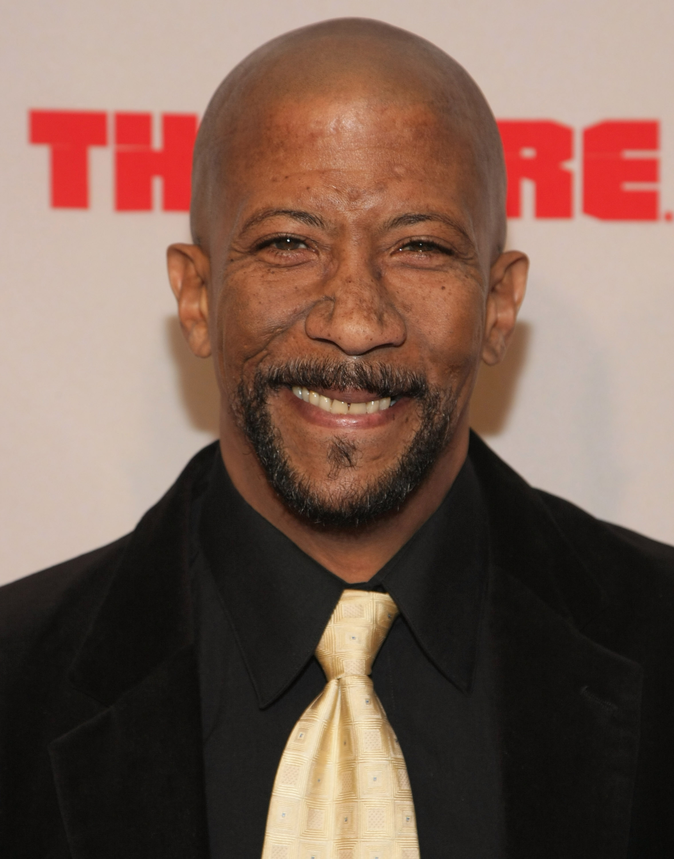 How tall is Reg E. Cathey?